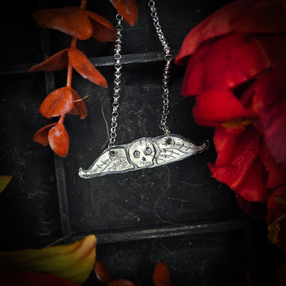 Small Death's head inspired pendant made from sterling silver